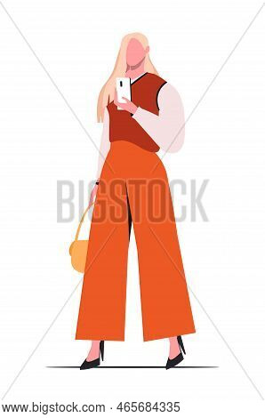 Beautiful Girl With Long Hair In Blond In Office Casual Clothes With A Phone And A Fashion Handbag I