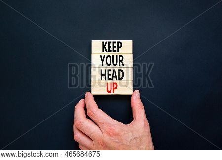 Keep Your Head Up Symbol. Concept Words Keep Your Head Up On Wooden Cubes. Beautiful Black Table Bla