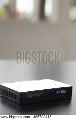 Led Aputure Mc Lit On Top Of A Black Table. Brightness Of Light. Led Concept. Lighting Concept.