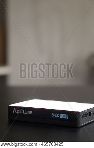 Led Aputure Mc Lit On Top Of A Black Table. Brightness Of Light. Led Concept. Lighting Concept.