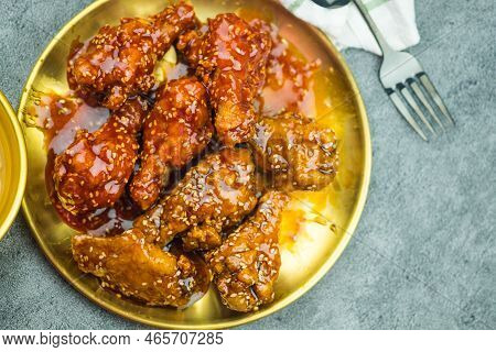 Deep-fried Chicken Wings Or Barbecue Sprinkled With Sesame. Spicy Korean-style Fried Chicken. Top Vi