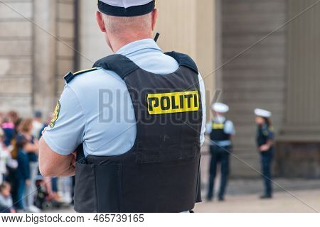 Politi Inscription On Danish Police Officer (politi Means Police In Danish Language).