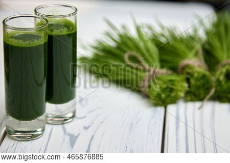 In Glass Glasses Poured Wheatgrass Obtained From Freshly Cut Wheatgrass. Wheatgrass Contains A Lot O