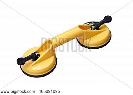 Yellow Handheld Device With Vacuum Suction Cups For Lifting Floor Panels, Isolated On A White Backgr