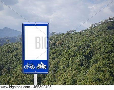 White Blank Of Bike And Bicycle Route Direction Signs With Mountaion And Cloudy Sky Behind, Mountain