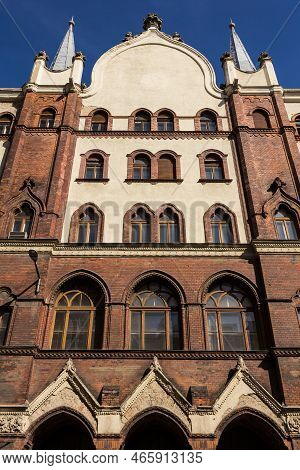 Historical Building In Budapest, Hungary. Close-up On Its Architectural Features (windows, Arches).