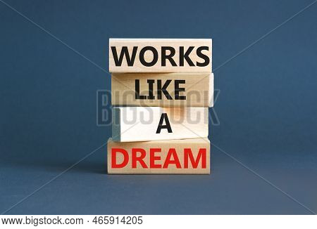 Works Like A Dream Symbol. Concept Words Works Like A Dream On Wooden Cubes. Beautiful Grey Table Gr