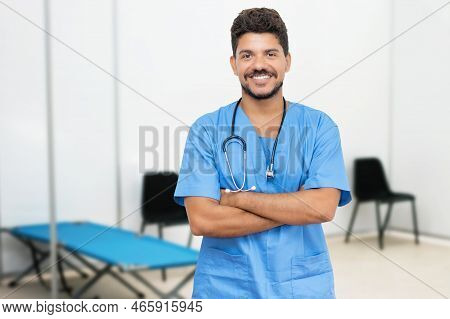 Laughing Mexican Male Doctor Is Ready For Vacinating Patients