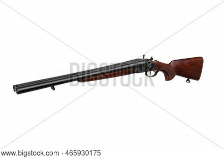 Classic Trigger Double-barreled Smooth-bore Hunting Rifle. Weapon With A Wooden Butt. Isolate On A W