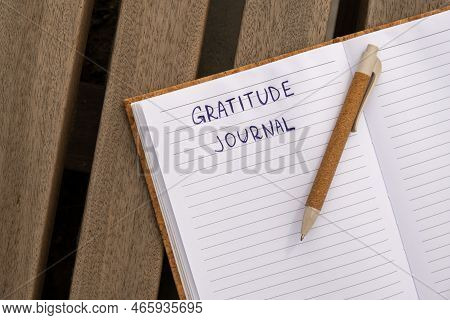 Writing Gratitude Journal On Wooden Bench. Today I Am Grateful For. Self Discovery Journal, Self Ref