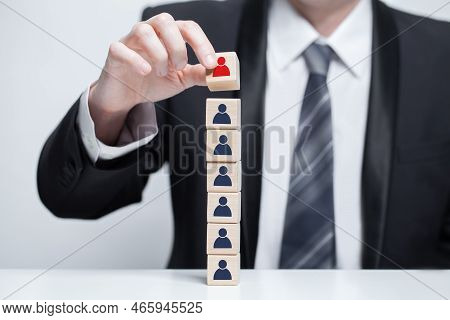 Wooden Blocks With People Icons, Businessman Hands Holding Cude, Leadership, Carieer, Business Conce
