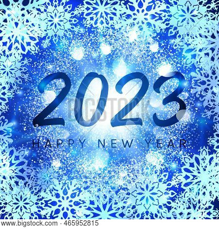 Happy New Year 2023 Banner On Blue Glittering Snowflakes Background. Greeting Card Design. Glowing A