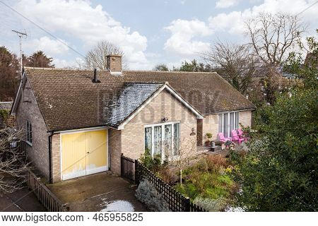Fen Ditton, Cambridge, England - Feb 2 2019: Raised Imaged Of Single Storey Home With Frost On Roof 