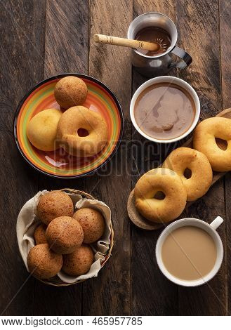 Traditional Colombian Breakfast - Buñuelo, Pandequeso, Almojabana, Coffee And Chocolate
