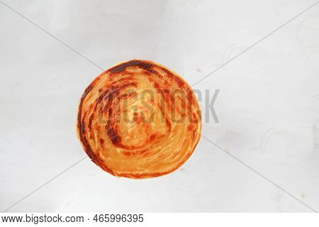 Paratha Bread Or Canai Bread Or Roti Maryam, Favorite Breakfast Dish. On White Background