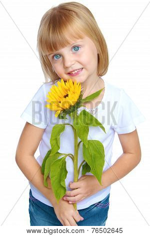 Little girl in blue jeans.
