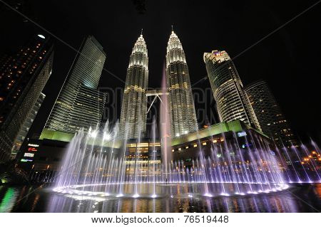 KUALA LUMPUR, MALAYSIA - AUGUST 31: Petronas Twin Towers at night on August 31, 2012 in Kuala Lumpur. Petronas Twin Towers  were the tallest buildings (452 m) in the world from 1998 to 2004.