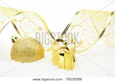 Golden Christmas Gifts,bauble Ribbon On Snow