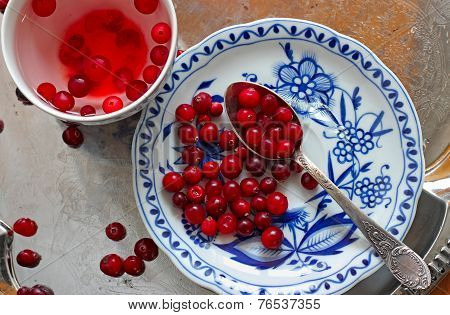 Cranberry Tea And Berries In Saucer On A Tray