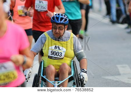 Senior Man In A Wheel Chair Racing