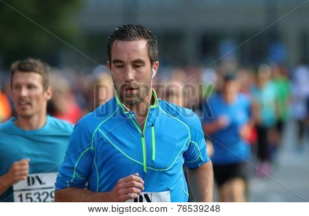 Focused Caucasian Man Running