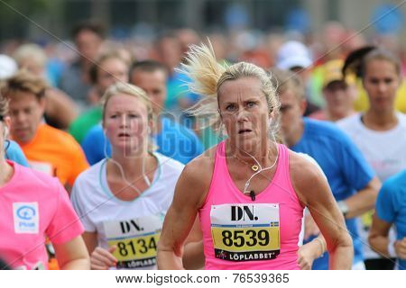 Focused Woman Running