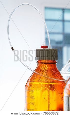 Glass Bottle With Plastic Hose