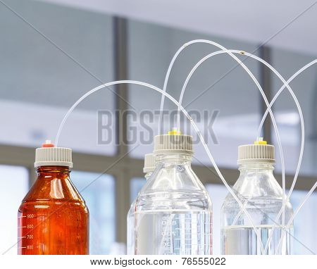 Glass Bottle With Plastic Hose