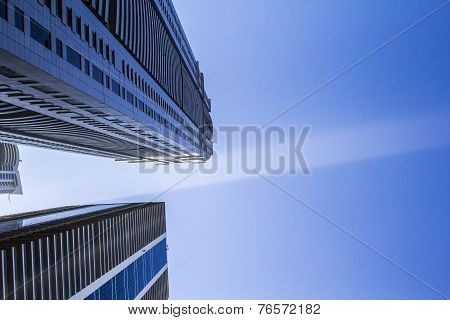a ray of sunshine between skyscrapers