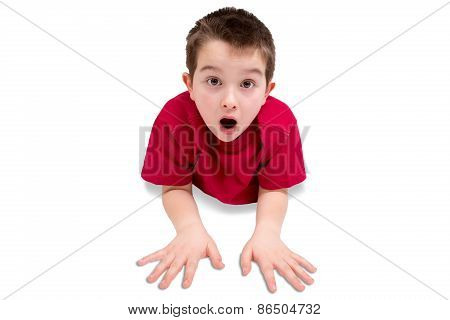 Surprised Cute Male Kid Lying On His Stomach