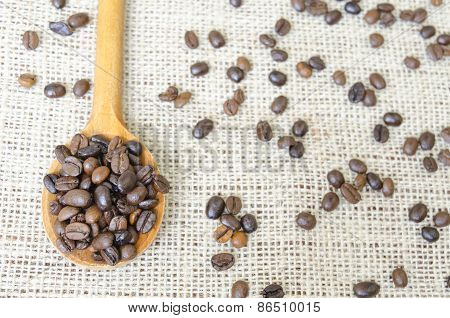 Wooden Spoon Full With Roasted Coffee Beans