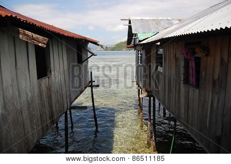 Timber Buildings With Piles At Sea Coast