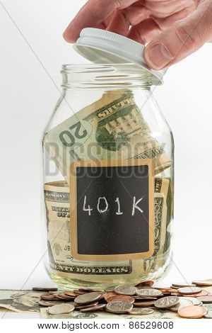 Hand Opening Glass Jar Used For 401K Fund