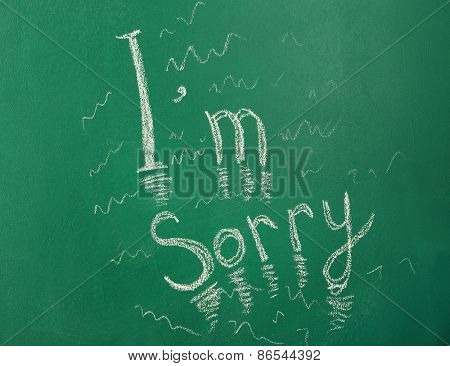 I am Sorry written with chalk on blackboard