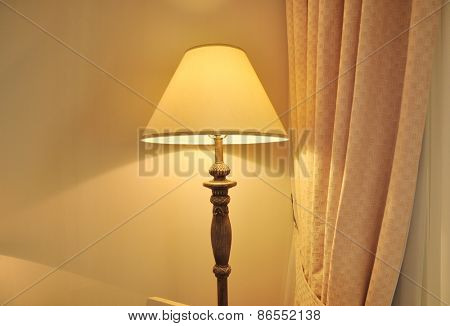 Close up of self standing illuminated lamp.