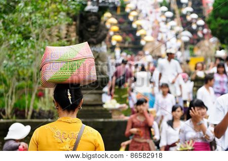 The Woman Is Carrying Gifts For Hindu Gods On The Head In The Woven Baske