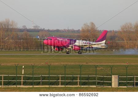 BUDAPEST, HUNGARY - MAY 5: Wizzair A320 landing at Budapest Liszt Ferenc Airport, May 5th 2014. Budapest is one of Wizzair's most important bases.