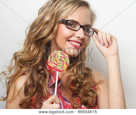 Nice young girl with lolipop