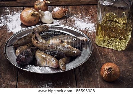 Raw Fish On The Table Cooks