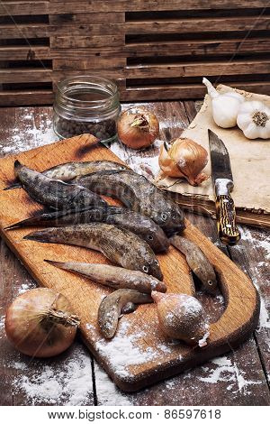 Raw Fish On The Table Cooks