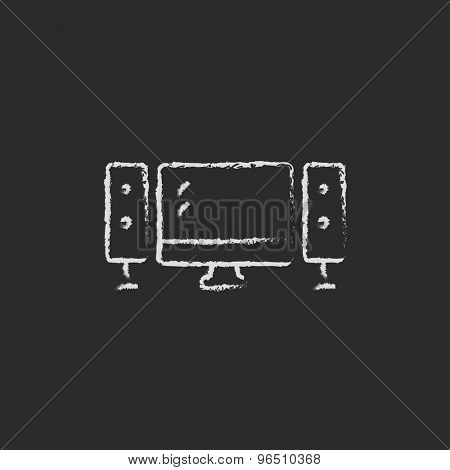 Flat screen television with speakers hand drawn in chalk on a blackboard vector white icon on a black background