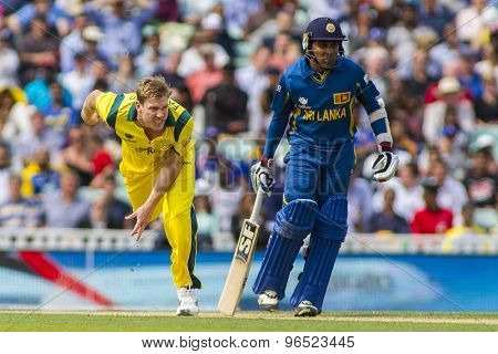 LONDON, ENGLAND - June 17 2013: Australia's James Faulkner and Sri Lanka's Mahela Jayawardene during the ICC Champions Trophy international cricket match between Sri Lanka and Australia.