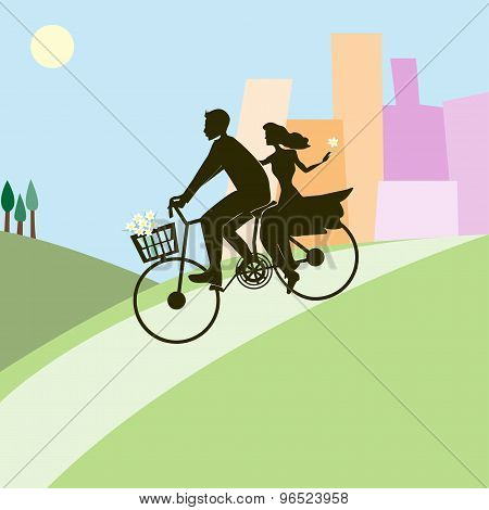 Loving couple on a bicycle