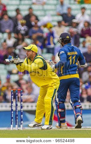 LONDON, ENGLAND - June 17 2013: Australia's Matthew Wade  and Sri Lanka's Kumar Sangakkara during the ICC Champions Trophy international cricket match between Sri Lanka and Australia.