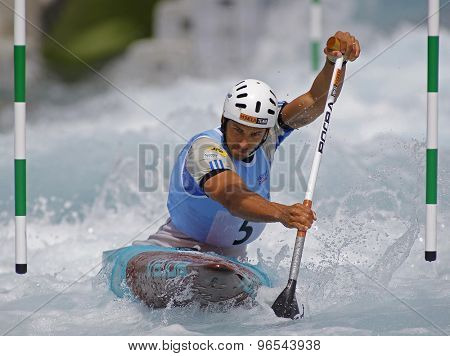 LONDON, ENGLAND - JUNE 06 2014 Matej Benus of Slovakia competes at the ICF Canoe Slalom held at the Lea Valley White Water centre Waltham Abbey.