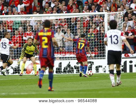 LONDON, ENGLAND. May 28 2011: Barcelona's midfielder Pedro RodrÃ?ÃÂ¢??guez scores  the first goal during the 2011UEFA Champions League final between Manchester United and FC Barcelona, at Wembley Stadium