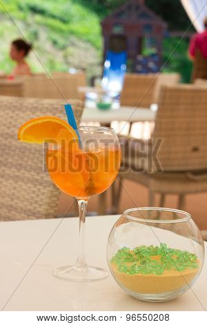 Cold orange cocktail summer . Mint and ice