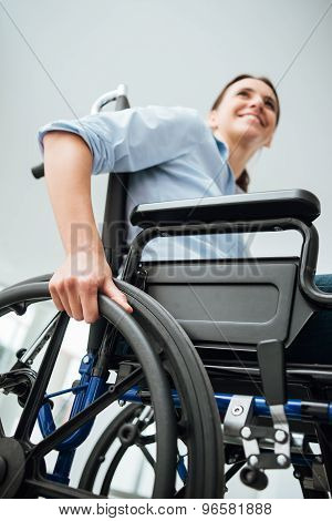 Smiling Young Woman In Wheelchair