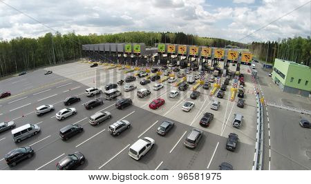 RUSSIA, MOSCOW - JUL 5, 2014: Lot of cars ride through fee. Aerial view. Photo with noise from action camera.Photo with noise from action camera