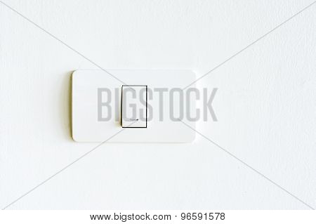 Lighting Switch On White Wall